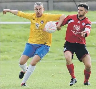  ??  ?? Silksworth CW (red) battle against Sunderland West End on Saturday. Pictures by Tim Richardson