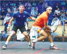  ??  ?? Mohamed ElShorbagy of Egypt (right) in action against Victor Crouin.