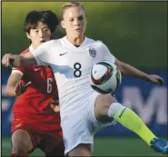  ?? Associated Press ?? MOM VIEWS — The Utah Royals’ Amy Rodriguez (8), seen playing in the World Cup for the U.S. on June 26, 2015, is one of a handful of mothers who play profession­al soccer in the NWSL. When the league asked players to travel to Utah and be sequestere­d for more than a month, moms’ voices were important.
