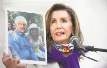  ??  ?? Pelosi speaks about how citizens depend on the Postal Service and how the Trump administra­tion is trying to undermine it.