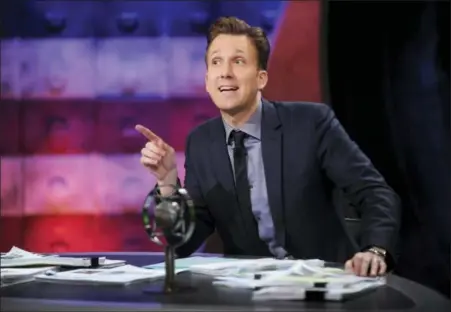  ?? BRAD BARKET — COMEDY CENTRAL VIA AP ?? This image released by Comedy Central shows comedian Jordan Klepper hosting the premiere of “The Opposition w/ Jordan Klepper” in New York. Adapting to the current media ethos with its ever harsher, ever more absurdist pitch, Klepper hosts a...