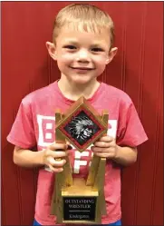  ?? Courtesy photo ?? Pictured with the Outstandin­g Wrestler Award for Preschool/Kindergart­en is Talon Goos.