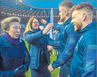  ??  ?? SRU President Dee Bradbury gives son Magnus a hug ahead of the Calcutta Cup match against England at Murrayfiel­d last month