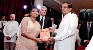  ??  ?? Father and daughter at the launch of Janaadhipa­thi Thaaththa; the book that reveals a telling incident of a temper tantrum by the young Sirisena