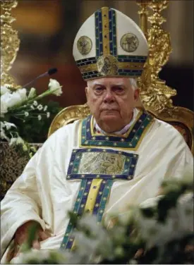  ?? ANDREW MEDICHINI — THE ASSOCIATED PRESS FILE ?? Cardinal Bernard Law celebrates Mass during the ceremony for Our Lady of the Snows, in St. Mary Major’s Basilica, in Rome, Italy. An official with the Catholic Church said Tuesday that Law, the disgraced former archbishop of Boston, has died at 86. Law...