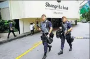  ?? REUTERS ?? Gurkhas patrol at the IISS Shangrila Dialogue in Singapore.