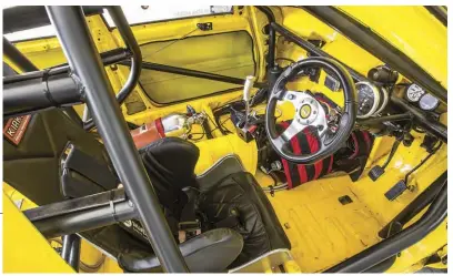  ??  ?? INTERIOR SEATS: Kirkey alloy STEERING WHEEL: Momo INSTRUMENT­ATION: Auto Meter tacho, oil-pressure, watertemp, Innovate air/fuel–ratio gauge EXTRA: Funny car–style roll cage