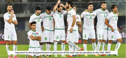  ??  ?? Iraq react to the disappoint­ment of going out of the Gulf Cup on penalties to the UAE. (AFP)