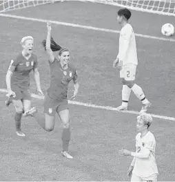  ?? FRANCOIS MORI/AP ?? The United States’ Alex Morgan, center, celebrates after scoring her team’s first goal during the Women’s World Cup match against Thailand on Tuesday in Reims, France.