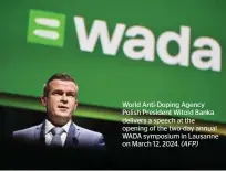  ?? (AFP) ?? World Anti-Doping Agency Polish President Witold Banka delivers a speech at the opening of the two-day annual WADA symposium in Lausanne on March 12, 2024.