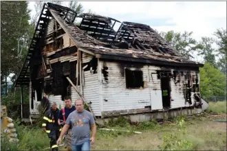  ?? RON SEYMOUR/The Daily Courier ?? The fire-damaged, city-owned Fleming House, which dates back to 1871, could soon be demolished because city officials are concerned about public safety.