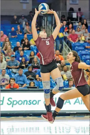  ?? BENJAMIN Krain/special to The Saline Courier ?? Taylor Lindberg jump sets in a match during her senior season with the UALR Trojans. Lindberg will go to Finland to play profession­al volleyball.