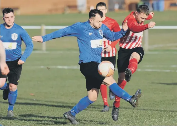  ??  ?? Wearside League Football between Farringdon Detached FC (red) and Darlington Town FC, played at Leyburn Grove, Houghton-le-Spring.