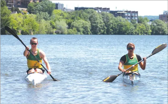  ?? GORDON LAMBIE ?? Zacharie Lauzière-fitzgerald of the National parakayak team and Anne-catherine Lavallee-latour of the Quebec kayak team practicing on the waters of Lac des Nations