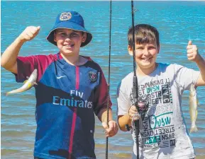  ??  ?? BROTHERS IN ARMS: Coen and Rhys Riddle found whiting on the bite near Cungulla.