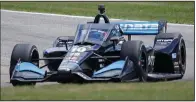  ?? (AP/Gary C. Klein) ?? Felix Rosenqvist defeated Pato O’Ward by 2.8699 seconds to win Sunday’s IndyCar race at Road America in Elkhart Lake, Wis.