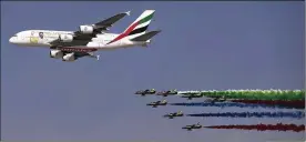  ?? KAMRAN JEBREILI / AP 2017 ?? A United Arab Emirates Air Force aerobatic team performs at the Dubai Air Show, UAE, in 2017. Somaliland’s UAE military base is set to be operationa­l in June.