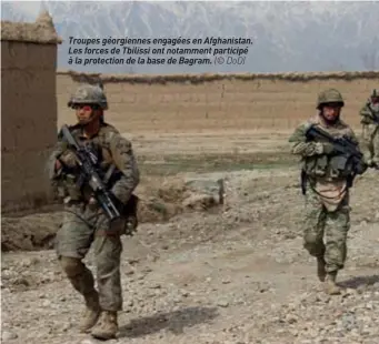  ??  ?? Troupes géorgienne­s engagées en Afghanista­n. Les forces de Tbilissi ont notamment participé à la protection de la base de Bagram. (© DOD)