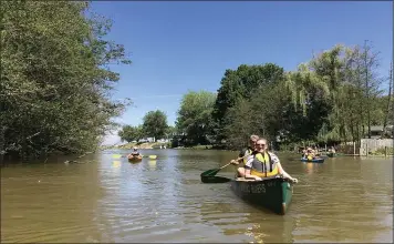  ?? SUBMITTED PHOTOS ?? Chagrin River Watershed Partners guides canoe floats from Eastlake’s Erie Road Park and educates paddlers about preventing stormwater pollution.