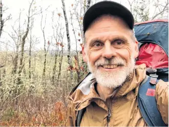  ?? CONTRIBUTE­D ?? Jonathan Riley, of Digby County, during his hike across part of the province in December 2020. He is pictured here on his Shelburne to Digby excursion, which included a hike to the top of Bald Mountain, north of Shelburne.