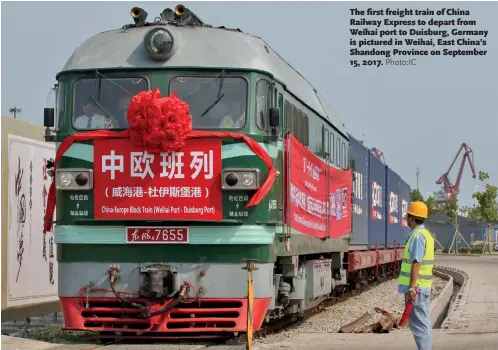  ??  ?? The first freight train of China Railway Express to depart from Weihai port to Duisburg, Germany is pictured in Weihai, East China’s Shandong Province on September 15, 2017.