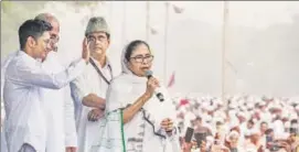  ?? PTI ?? TMC chief and chief minister Mamata Banerjee, along with her nephew and party general secretary Abhishek Banerjee, addresses a public meeting in Kolkata on Thursday.