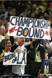  ?? CHRIS GRAYTHEN / GETTY IMAGES ?? Saints fans celebrate during their team’s win over the defending Super Bowl champion Eagles in the divisional round last weekend.