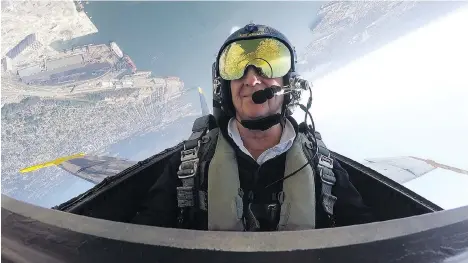  ?? FRANCIS GEORGIAN ?? Postmedia reporter Larry Pynn takes flight in an F/A-18 Hornet with the U.S. Navy’s Blue Angels, ahead of the Abbotsford Internatio­nal Air Show, with pilot Lt. Andre Webb at the controls. Webb has flown 2,300 hours in military aircraft, about half those in the Hornet.