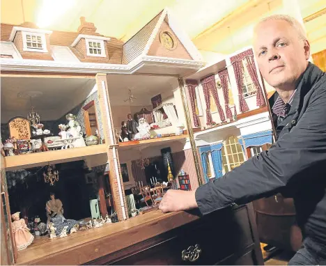  ??  ?? A DUNDEE auctioneer is putting an unusual property up for sale in the hope of raising cash for charity.
The “larger-than-life” doll’s house will go under the hammer at B.L. Fenton & Sons in Victoria Road on Thursday.
The doll’s house — which took the...