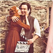  ?? Poldark ?? The end: Eleanor with Aidan Turner as they finish filming