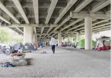  ?? ?? The city closed a tent city located near Minute Maid Park in an effort to find housing for homeless individual­s.