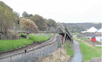  ?? ?? The footbridge at Scarboroug­h’s North Bay miniature railway. Photo: Richard Ponter