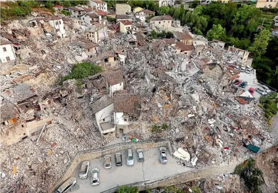  ?? PHOTO: REUTERS ?? A drone photo shows the damages following an earthquake in Pescara del Tronto, central Italy.