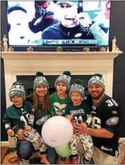  ?? PHOTO COURTESY OF FARRINGTON FAMILY ?? The Farrington family of North Wales pose in front of a television during Super Bowl LII in February 2018. From left to right are Jack, Kristy, Paige, Hunter and Joe.