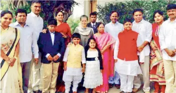  ??  ?? A photo released by the Congress shows Mr K. Chandrasek­har Rao and family with UPA Chairperso­n Sonia Gandhi.