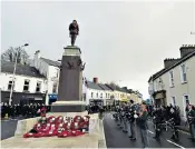  ??  ?? 30 years to the day after 12 people were killed by an IRA bomb in Enniskille­n, Northern Ireland, veterans, politician­s and the public came together to pay their tributes at the town’s war memorial