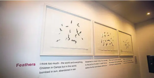  ?? Picture: Steve MacDougall. ?? Jim’s poem Feathers at Perth Concert Hall’s Threshold artspace.