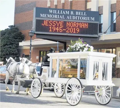  ?? Photos / AP ?? A horse-drawn hearse carries the body of Jessye Norman, pictured left performing.