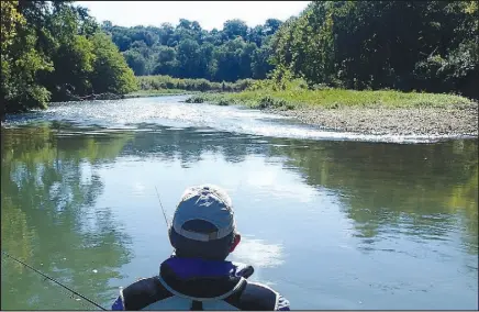  ?? DEMOCRAT-GAZETTE ?? FLIP PUTTHOFF/NWA The Illinois River is one of several area streams that are fine destinatio­ns for spring float trips.