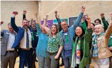  ?? ?? Green Party councillor­s and campaigner­s celebrate making gains in North Somerset