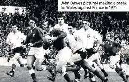  ??  ?? John Dawes pictured making a break for Wales against France in 1971