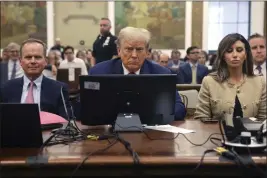  ?? SPENCER PLATT — POOL PHOTO VIA AP ?? Former President Donald Trump listens during his civil fraud trial at the State Supreme Court building in New York on Wednesday.