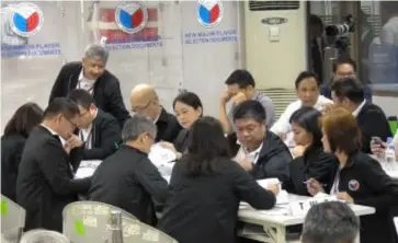  ??  ?? THE Technical Working Group evaluates the selection documents of three bidders for the new major player in the telecommun­ications industry on Wednesday, November 7, 2018. DICT