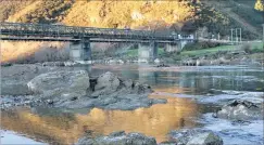  ??  ?? High and dry . . . Mark Pettinger, of Cromwell, sent today’s photo and this explanatio­n: ‘‘On the way home from Dunedin to Cromwell last Saturday we had to stop as per usual at the historical Beaumont bridge as the lights always seem to be red when we...