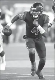  ?? File Photo/AP ?? Texans quarterbac­k Deshaun Watson scrambles Sept. 14 against the Bengals in Cincinnati.
