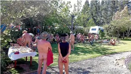  ?? KAY HANNAM/SUPPLIED ?? Members of the naturist community showed their support for Parkinson’s disease awareness over the weekend.