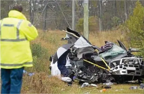  ?? PHOTO: FILE ?? TRAGEDY: The scene of the tragic fatal accident on the New England Highway.