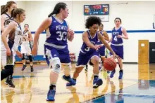  ?? Staff photo by Joshua Boucher ?? Paul Pewitt’s Ebbony Cobbins recovers a loose ball against Fouke on Friday in Redwater, Texas.