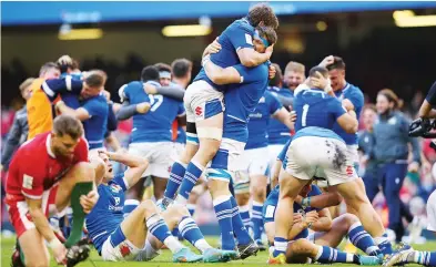  ?? PICTURE: Getty Images ?? On the up: Italy celebrate after the Six Nations win against Wales