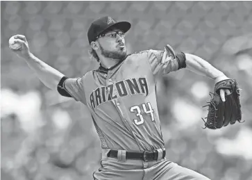  ?? PATRICK MCDERMOTT/ USA TODAY SPORTS ?? D-Backs starting pitcher Braden Shipley (34) throws a pitch to a Washington Nationals batter in the first inning during a game at Nationals Park on Thursday. Shipley struggled against the Nationals, issuing six walks in four-plus innings.